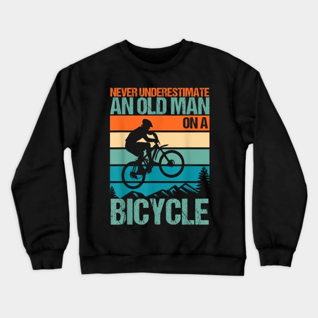 Never Underestimate An Old Guy With A Bicycle Crewneck Sweatshirt by rhazi mode plagget